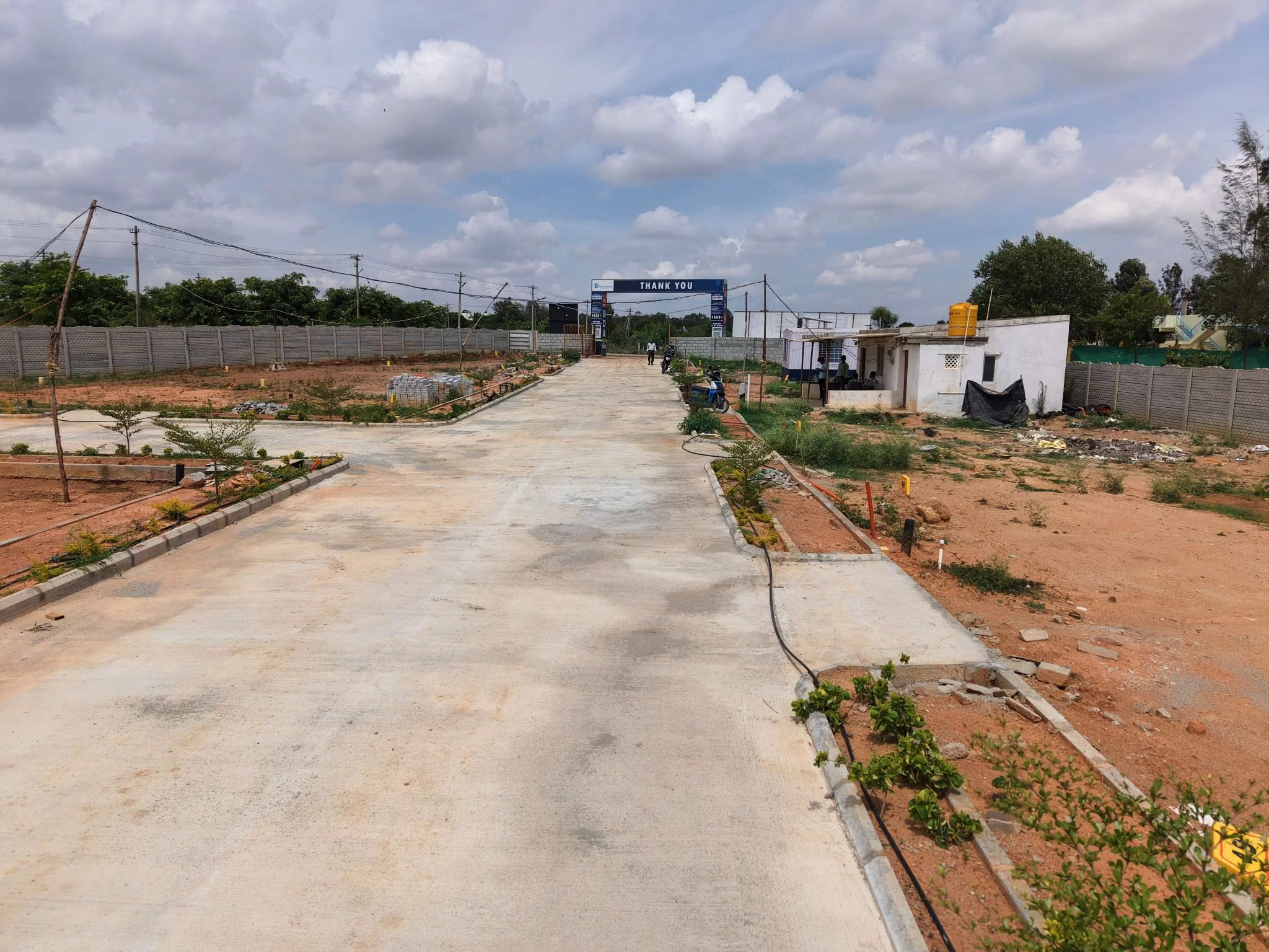 Well-maintained footpaths and street infrastructure inside Shelter Enclave, ensuring safe pedestrian movement for residents.