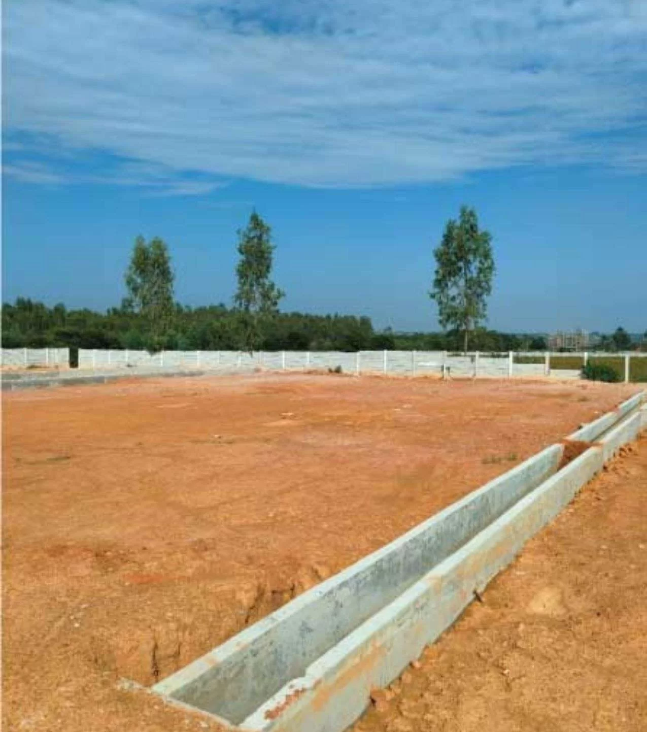 Strong compound wall and CCTV security setup surrounding Shelter Enclave, providing complete safety and boundaries.
